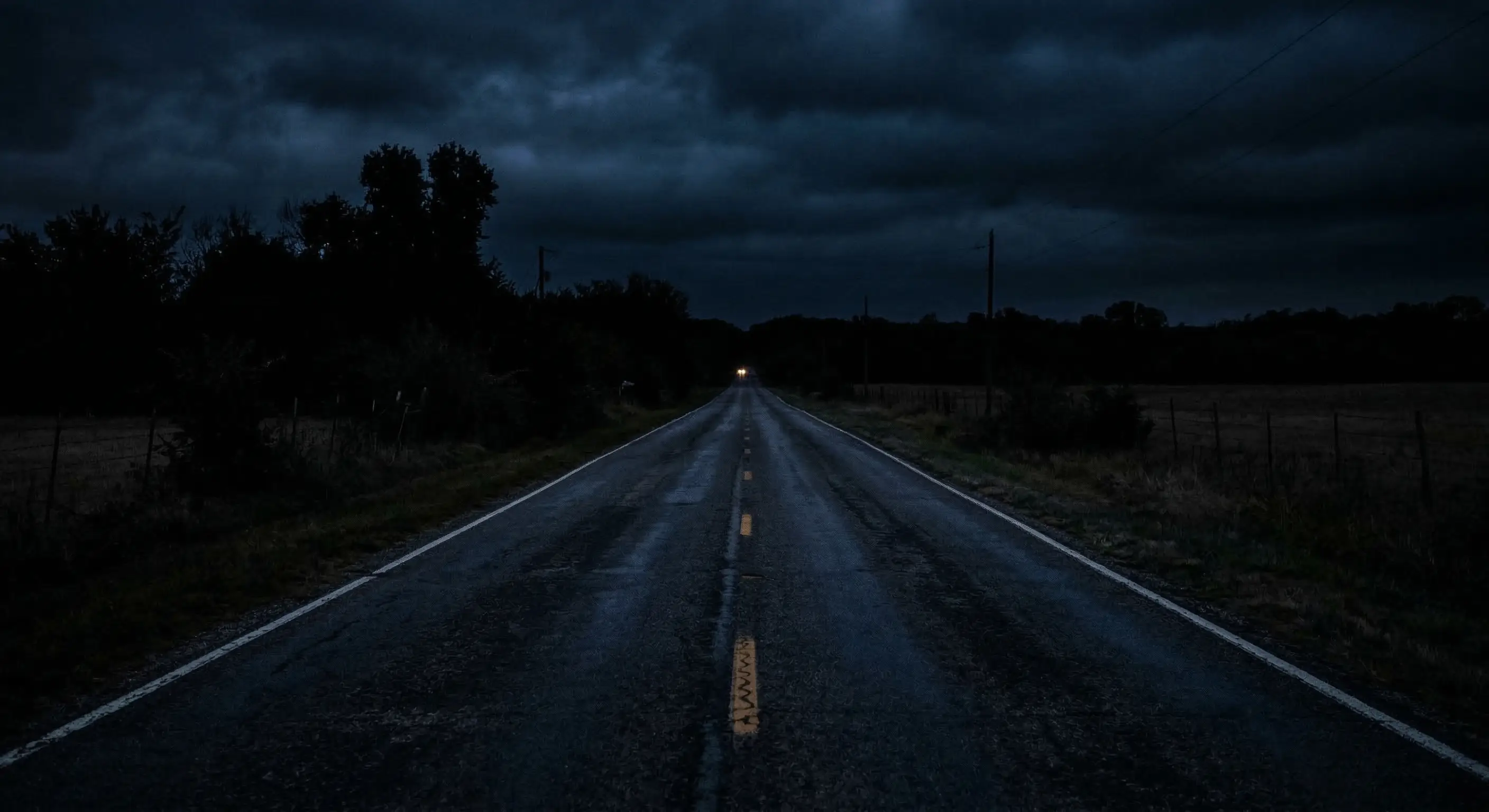 Dark highway at night